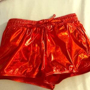 metallic red shorts, worn once